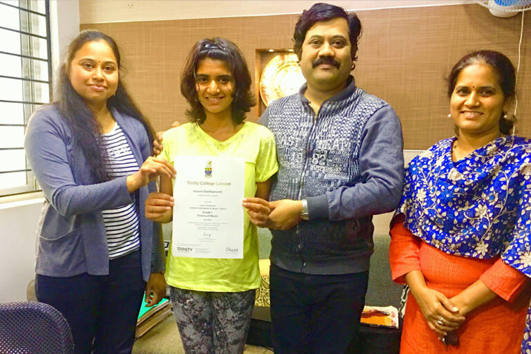 Mahesh Mahadev Distributing Certificate to Student